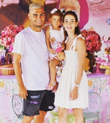 Andreas Pereira with his wife and daughter
